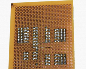 solder capacitor pins